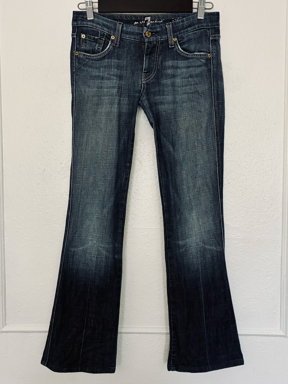 7 For All Mankind women's bootcut jeans featuring a dark wash denim finish sz.26